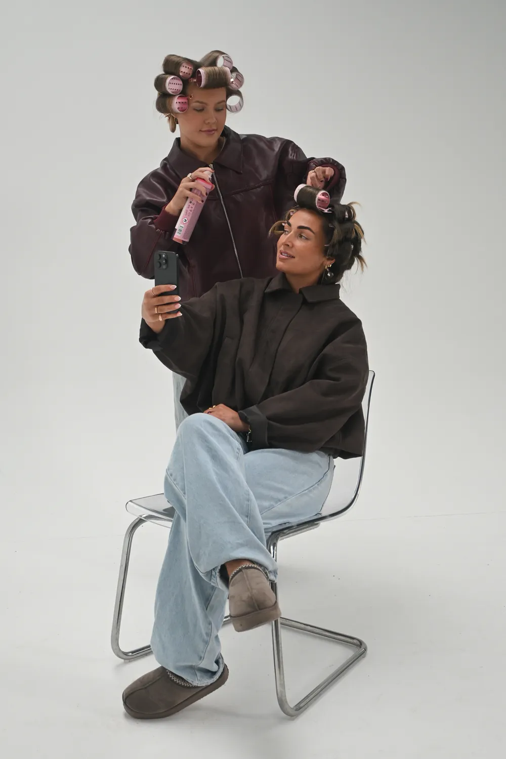 Willow styling a client during a session