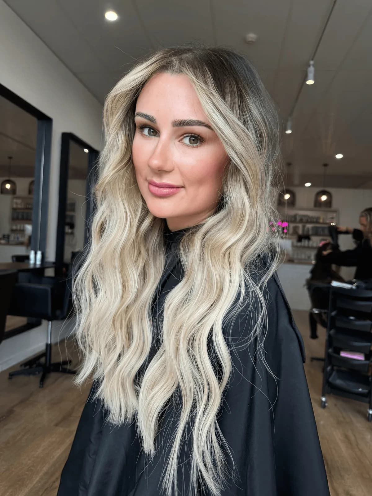 Blonde balayage with weft extensions for length and thickness